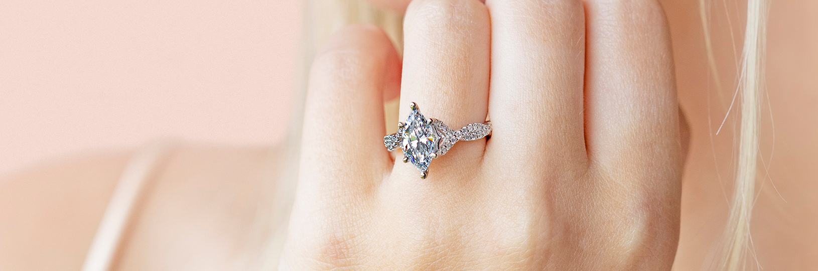 A flashy lab grown marquise cut diamond paired with an accented band.