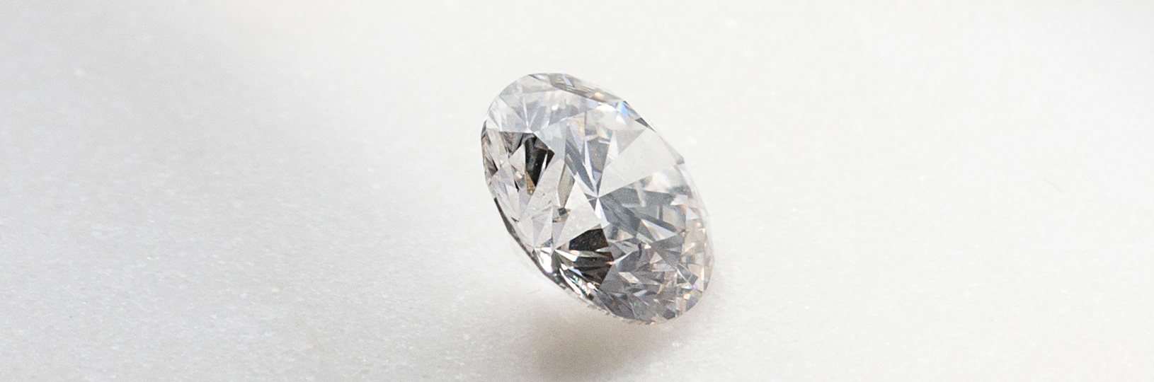 Close up image of an oval cut lab grown diamond