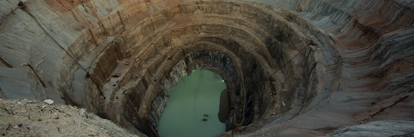 An aerial image of an open-pit mine