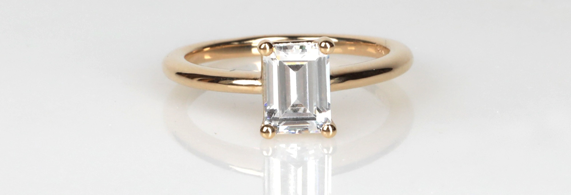 Eave Emerald Cut Engagement Ring in 18K Yellow Gold