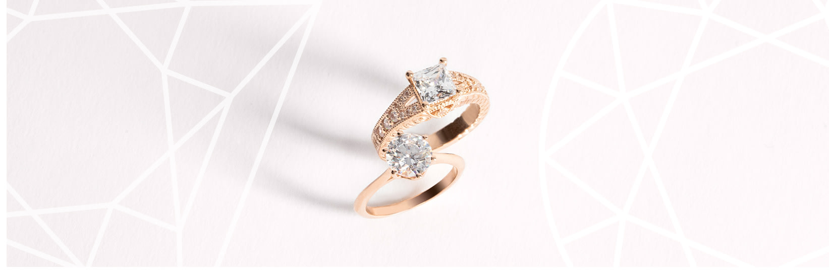 A princess cut engagement ring and a round cut engagement ring side-by-side