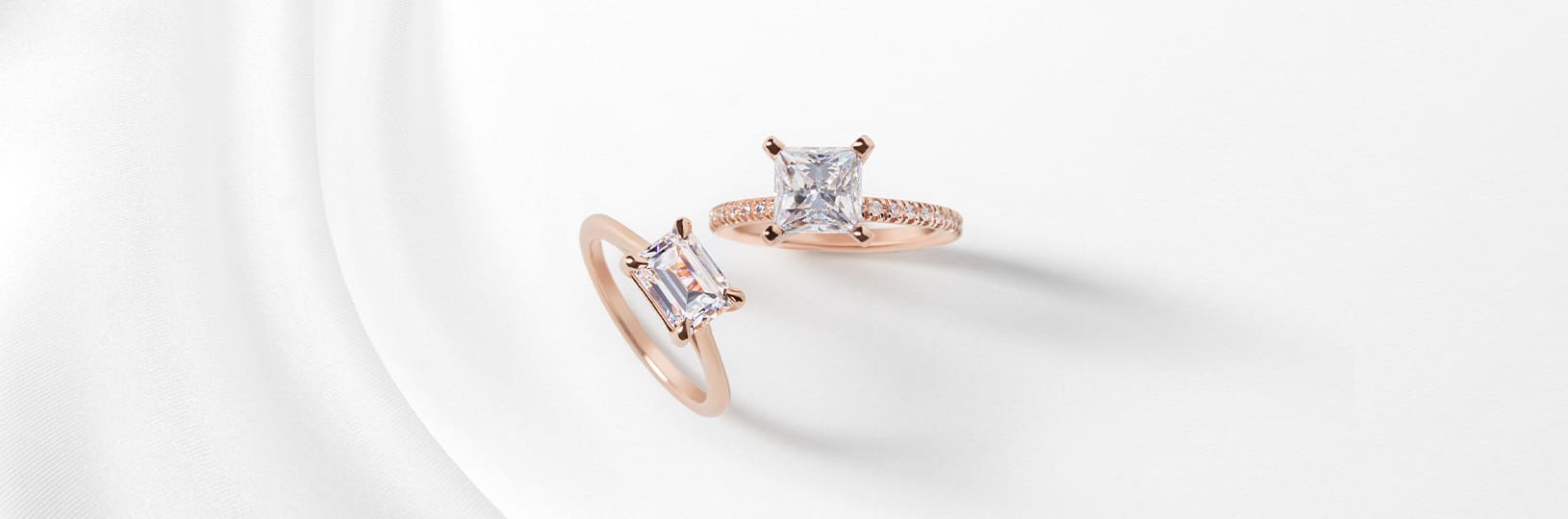 Two rose gold engagement rings