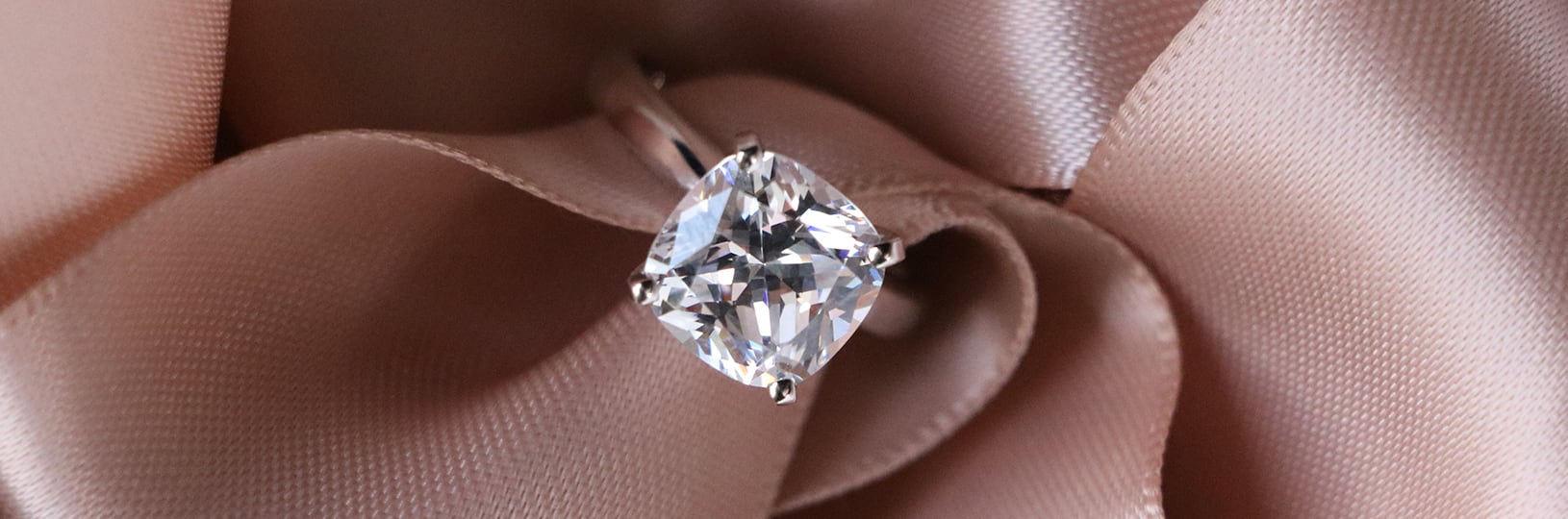 Cushion cut lab created diamond engagement ring.